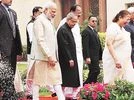 From left: Prime Minister Narendra Modi with President Pranab Mukherjee and others outside Parliament's Central Hall on Monday From left: Prime Minister Narendra Modi with President Pranab Mukherjee and others outside Parliament's Central Hall on Monday