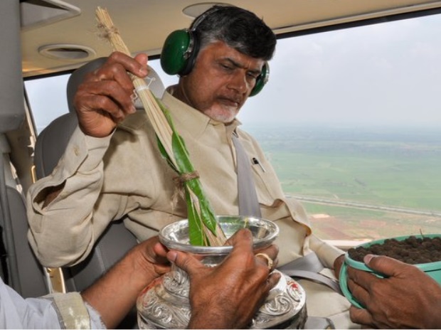 Soil and water being sprinkled over Amaravati