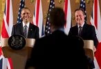 President Barack Obama and British Prime Minister David Cameron listen to a reporter's question during a joint news conference at 10 Downing Street, Cameron's official residence in London. (Photo: AP/ PTI) President Barack Obama and British Prime Minister David Cameron listen to a reporter's question during a joint news conference at 10 Downing Street, Cameron's official residence in London. (Photo: AP/ PTI)