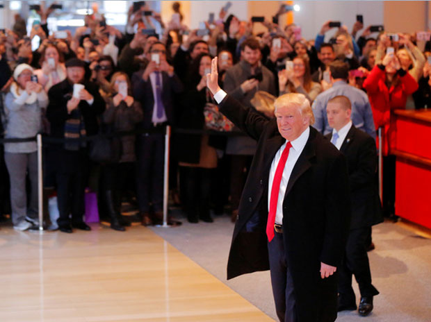 America's jobless rate falls, payrolls rise