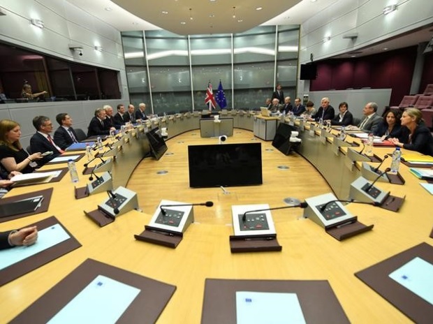 EU, Brexit, Britain, UK, Europe Britain's Secretary of State for Exiting the European Union David Davis and his delegation sit across from European Union's chief Brexit negotiator Michael Barnier and his delegation at the start of their first day of talks at the European Commission