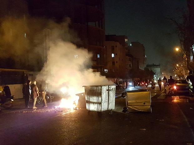 As protests persist, Rouhani warns Iran will respond to 'lawbreakers' As protests persist, Rouhani warns Iran will respond to 'lawbreakers'