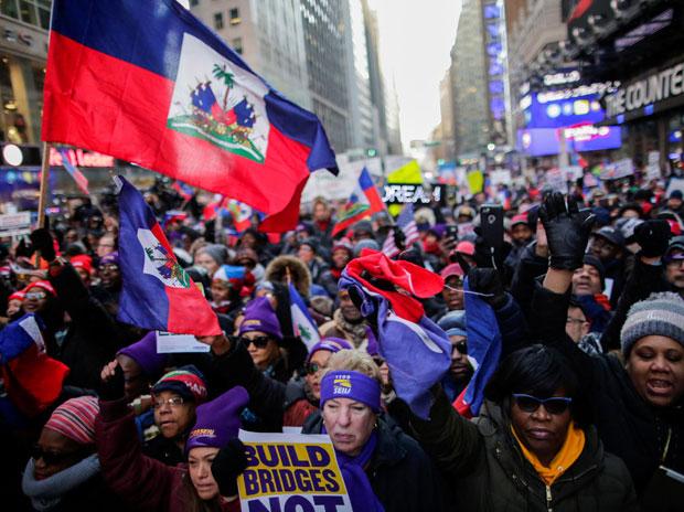 In pics: Haitian-Americans protest Donald Trump's 'racism' at Times Square In pics: Haitian-Americans protest Donald Trump's 'racism' at Times Square