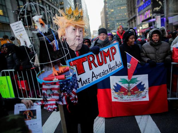 In pics: Haitian-Americans protest Donald Trump's 'racism' at Times Square In pics: Haitian-Americans protest Donald Trump's 'racism' at Times Square