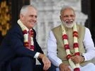 Malcolm Turnbull and Narendra Modi wear flowers while visitng Akdhardham Madir hindu temple in New Dehli Malcolm Turnbull and Narendra Modi wear flowers while visitng Akdhardham Madir hindu temple in New Dehli