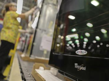 The company logo has done away with the swirl above the letter W (in picture) in the new version. Photo: Reuters