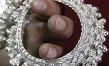 Silver futures down on global cues