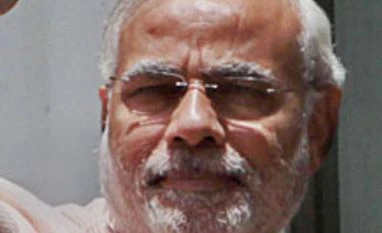 That stubborn stain on Modi's record