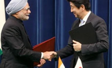 India, Japan grapple with matching words & action Manmohan Singh,Shinzo Abe