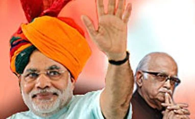 Monsoon showers cannot hide Modi's grin