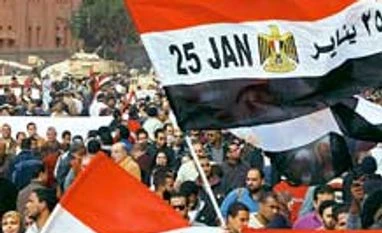 Egyptian army chief warns protesters over disruption after Morsi deposition