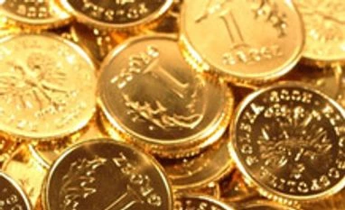 Gold futures down 0.2% on weak global cues