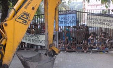 Campa Cola residents vow to not hand over their keys