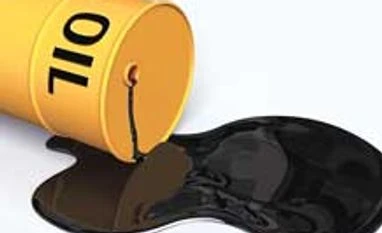 Oil slumps to near six-year low under $44