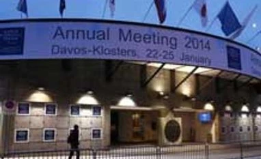 Davos billionaires wary of terrorism, predict low interest rates