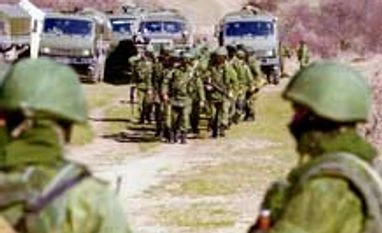 Putin calls end to snap drill of armed forces