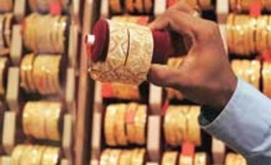 Gold, silver fall on weak global cues, low demand Gold, silver fall on weak global cues, low demand