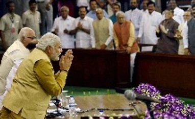 Narendra Modi: From a poor, small town boy to the centre of power