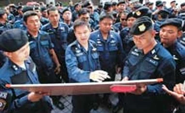 Huge Thai security force deployment stifles coup protests