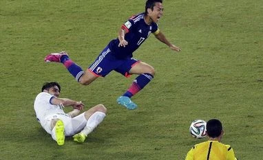 Colombia into last 16 after Japan fail to crack 10-man Greece