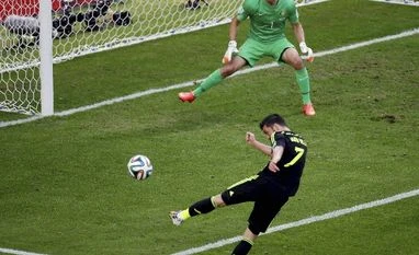 Spain restore pride with win over Australia