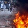 A bike burning during violent clashes between two communities over a land dispute in Saharanpur