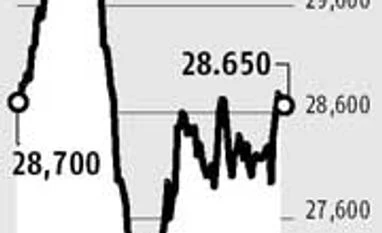 Profit-booking pulls gold down marginally