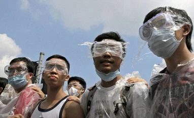 Hong Kong democracy activists defy police in standoff