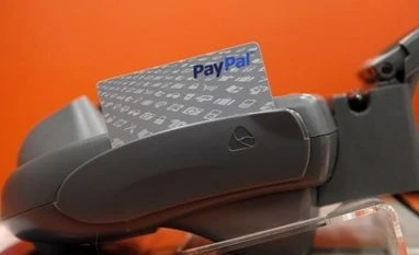 Paypal reports 86% jump in Q1 profit due to e-commerce growth; stock up 6% A PayPal card sits at a cashier station at a Home Depot store in Daly City, California