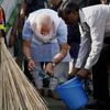 Prime Minister Narendra Modi kicks off the Swachh Bharat campaign in New Delhi's Balmiki Basti on Thursday