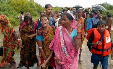 68,000 evacuated in Odisha as Cyclone Hudhud lands in AP