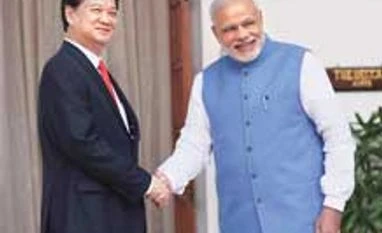 India, Vietnam decide to step up security, defence ties Prime Minister Modi with his Vietnamese counterpart Nguyen Tan Dung in New Delhi on Tuesday