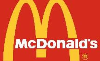 McDonald's modifies business strategy as sales, earnings drop