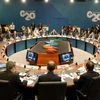 Leaders meet during a plenary session at the G20 leaders summit in Brisbane