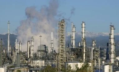 Oil falls $2 to four-year low on OPEC output cut doubts