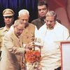 The President of India, Pranab Mukherjee, launches the Karnataka Mobile One App in Bengaluru on Monday. Also  seen are Governor Vajubhai Vala and Chief Minister Siddaramaiah