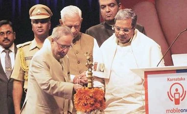 Karnataka egovernance initiative has miles to go to fulfil promises The President of India, Pranab Mukherjee, launches the Karnataka Mobile One App in Bengaluru on Monday. Also seen are Governor Vajubhai Vala and Chief Minister Siddaramaiah