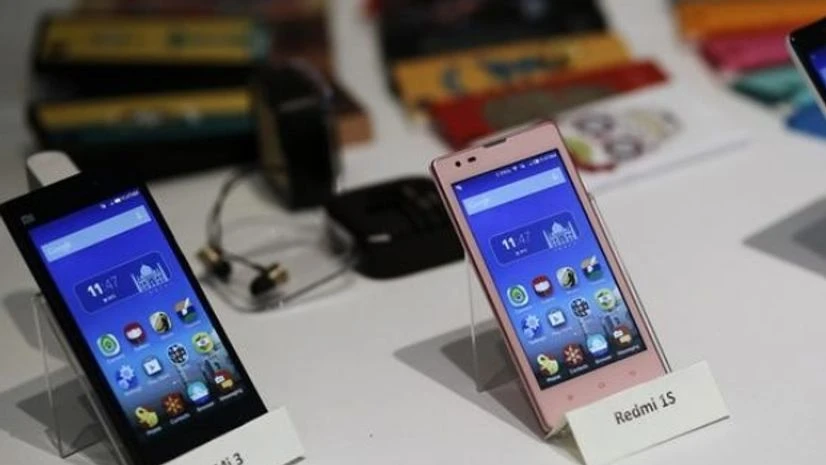 Two models of China's Xiaomi Mi phones are pictured during their launch in New Delhi. Photo: Reuters Two models of China's Xiaomi Mi phones are pictured during their launch in New Delhi. Photo: Reuters