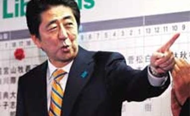 Abe secures big win in Japan snap polls amid low turnout Shinzo Abe