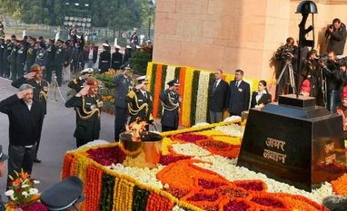 Forgetting real heroes, celebrating filmi ones Defence Minister Manohar Parrikar along with Air Chief Marshal Arup Raha, Naval Chief Admiral RK Dhowan and Army chief Gen Dalbir Singh pays homage to the martyrs at Amar Jawan Jyoti on the occassion of 'Vijay Diwas' in New Delhi on Tuesday