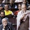 Prime Minister Narendra Modi with Union Finance Minister Arun Jaitley in the Rajya Sabha