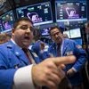 Traders work on the floor of the New York Stock Exchange