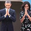 US President Barack Obama and first lady Michelle Obama fold their hands in a namaste gesture before their departure from Air Force Station, Palam, in New Delhi on Tuesday
