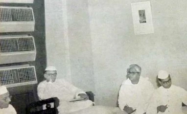 40 years ago...And now: Diversified Voltas' core saved it Voltas’ Crystal ACs keep Congressmen cool (Morarji Desai on the extreme left, with the ACs in the background)