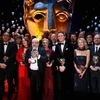 Winners pose on the stage,  during the British Academy  Film and Television Awards 2015