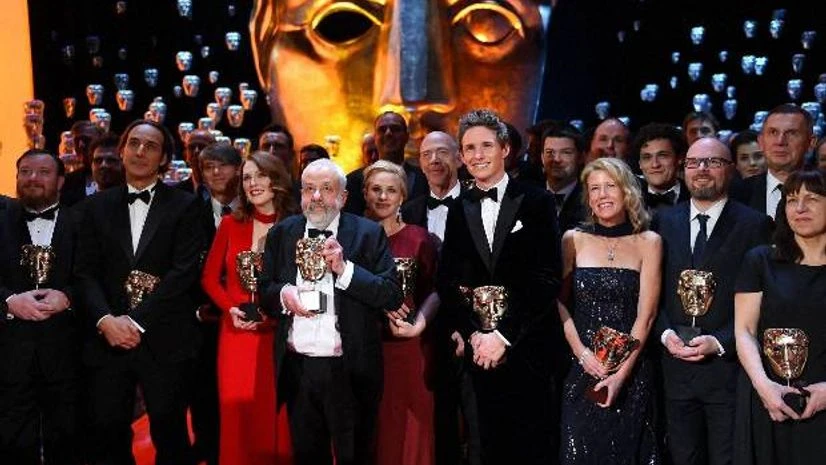Winners pose on the stage, during the British Academy Film and Television Awards 2015