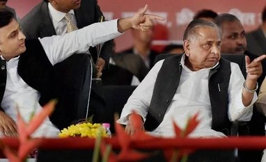 In a major reshuffle, 60 IAS, IPS officers, Greater Noida CEO transferred A file photo of UP CM Akhilesh Yadav and Samajwadi Party chief Mulayam Singh Yadav