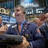 Traders work on the floor of the New York Stock Exchange