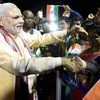Prime Minister Narendra Modi greets people of Indian community upon his arrival at Mahe in Seychelles
