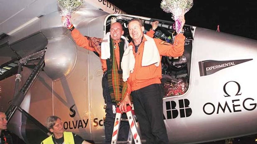 Pilots Bertrand Piccard and André Borschberg (right) soon after arrival in Ahmedabad on Tuesday night Pilots Bertrand Piccard and André Borschberg (right) soon after arrival in Ahmedabad on Tuesday night